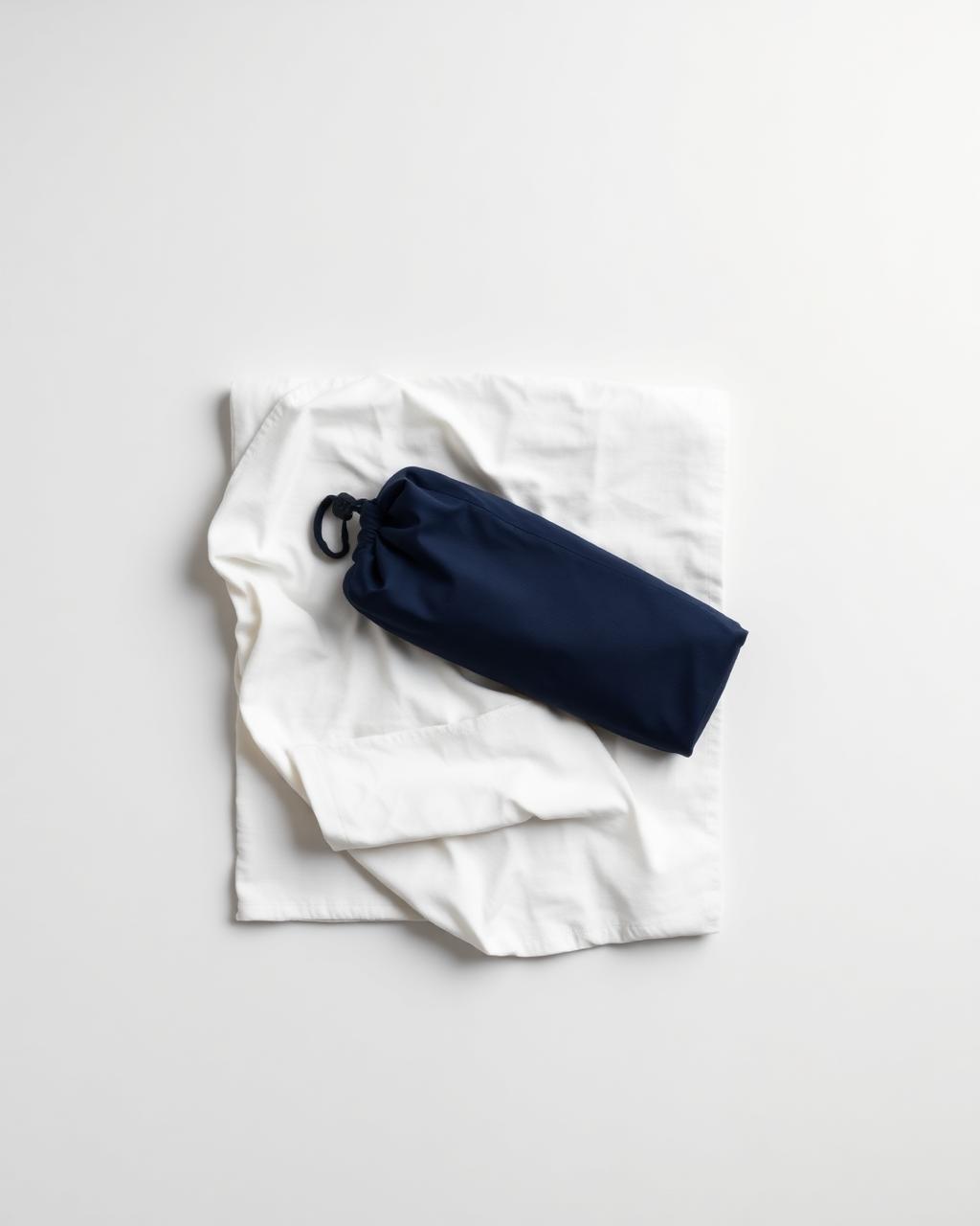Stack of crisp, neatly folded white linens from a Nodux pickup