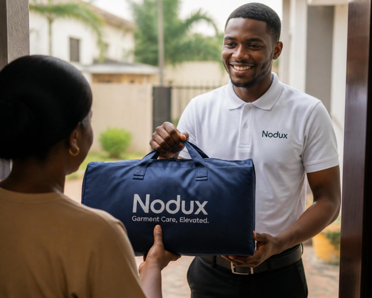 Concierge handing garments at the door